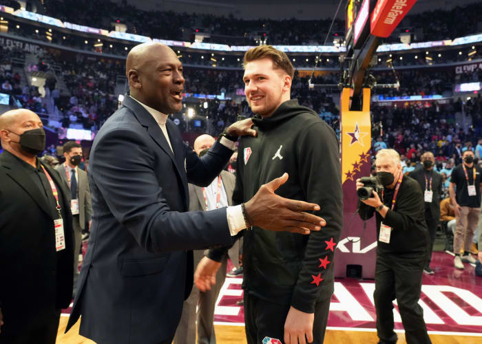 Michael Jordan and Luka Doncic share a moment at NBA All-Star Weekend in Cleveland during the 2021-22 season.